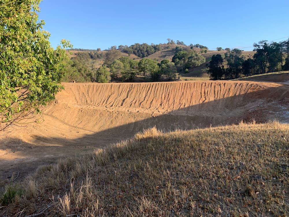 There is a Large Body of Water in the Middle of a Field — Gears Excavation In Cedar Pocket, QLD