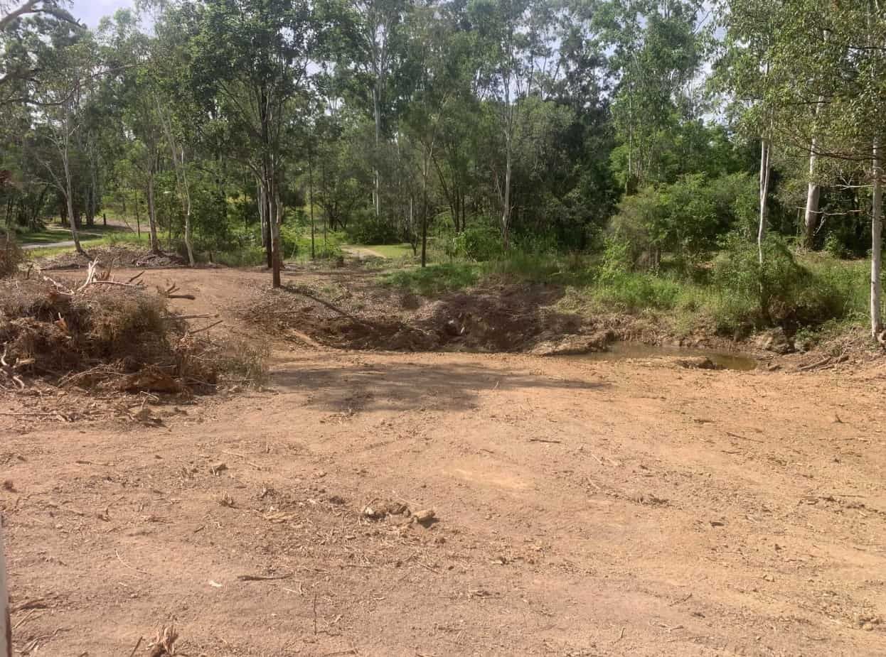 A Dirt Road Going Through a Forest With Trees — Gears Excavation In Cedar Pocket, QLD