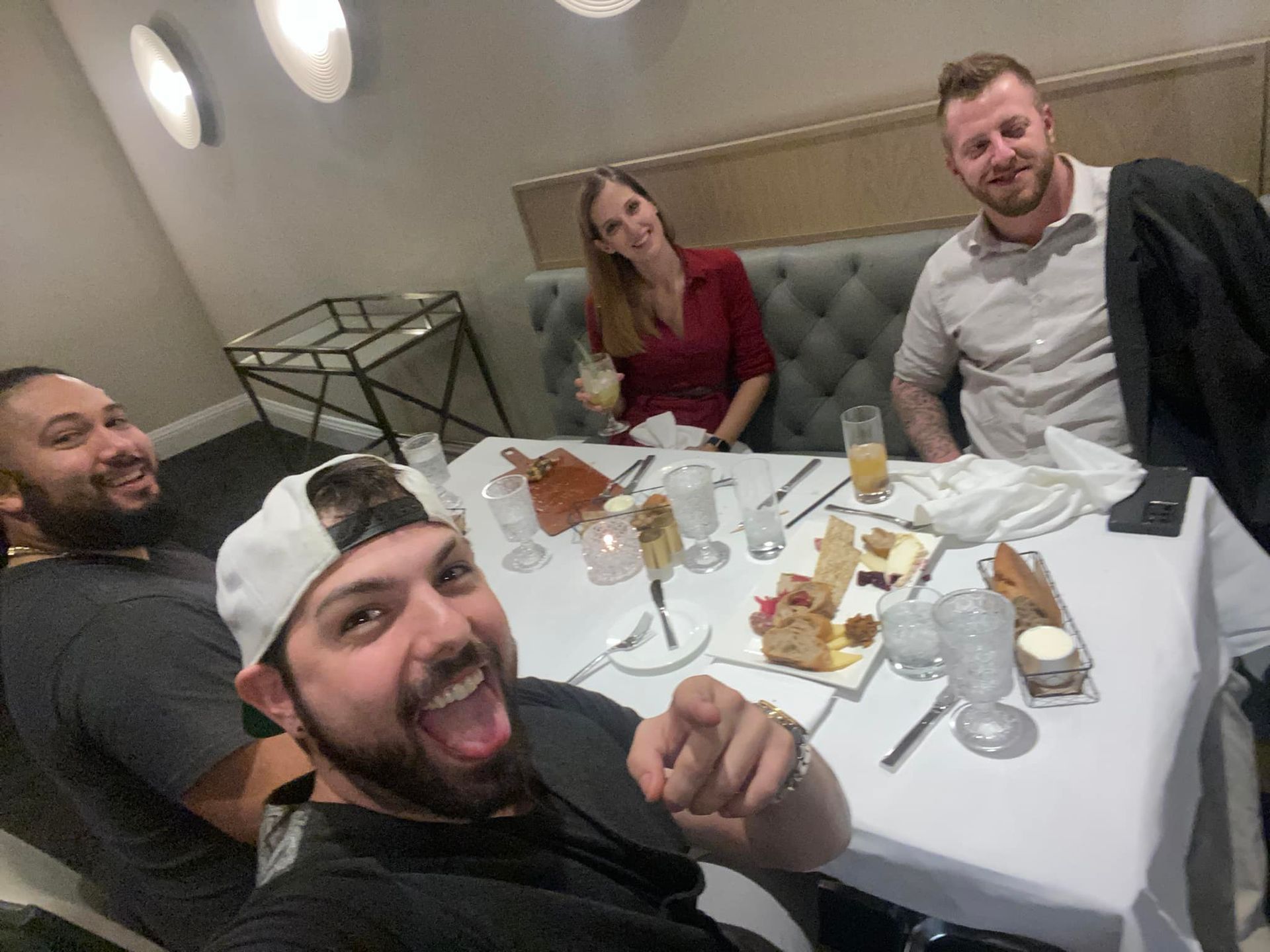 Dakota Brokhoff sitting at a table with RC Moore