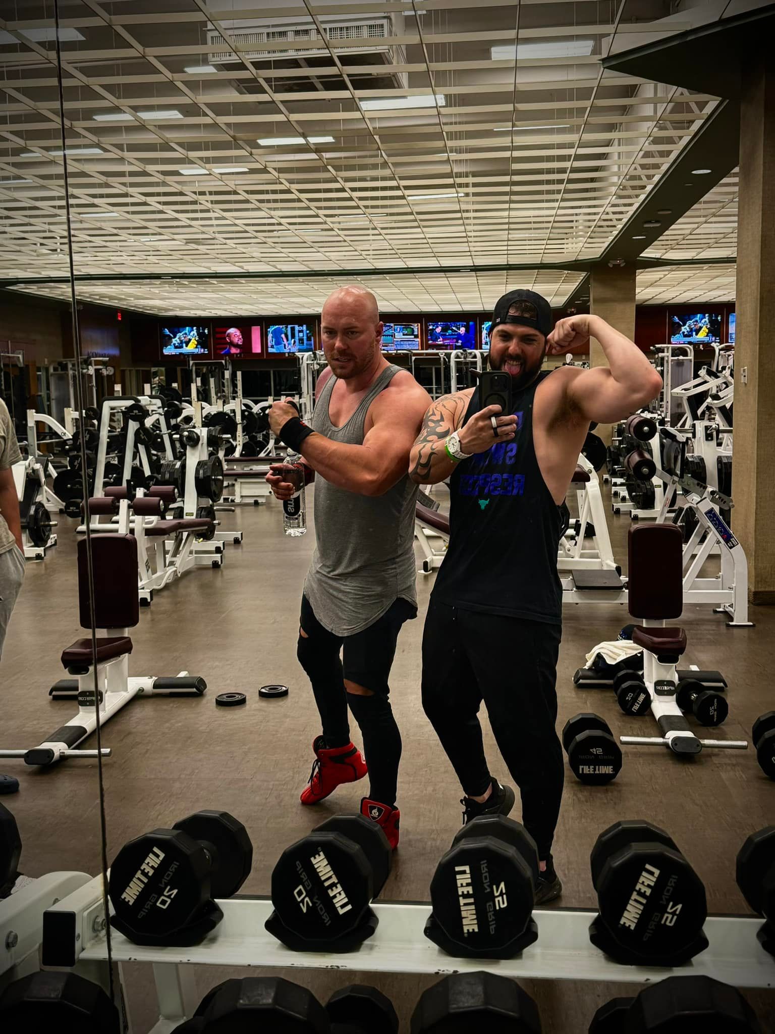 Dakota Brokhoff in a gym with Remington McDermott