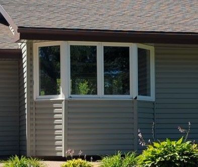 House With Close Window — Carver, MN — TJ Exteriors Inc.
