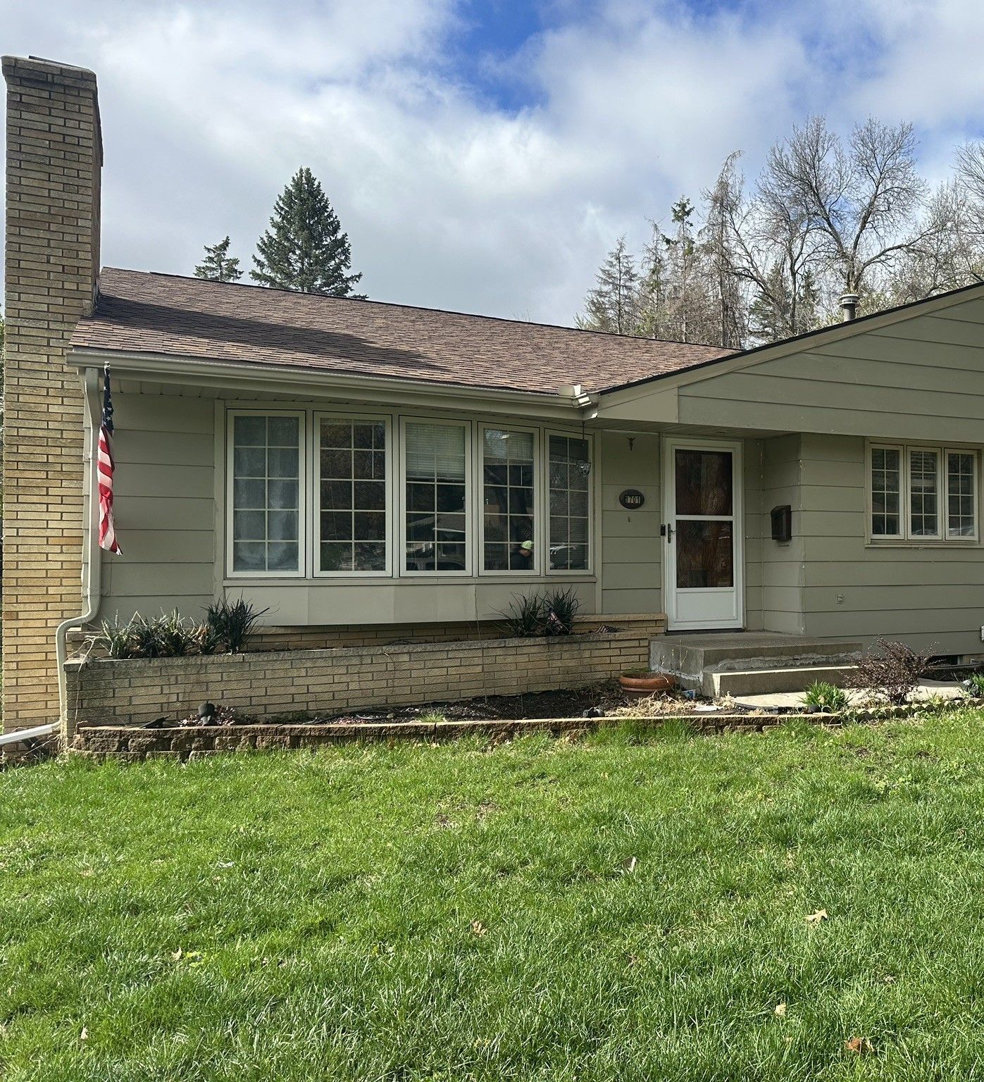Side View of Blue House Before — Carver, MN — TJ Exteriors Inc.