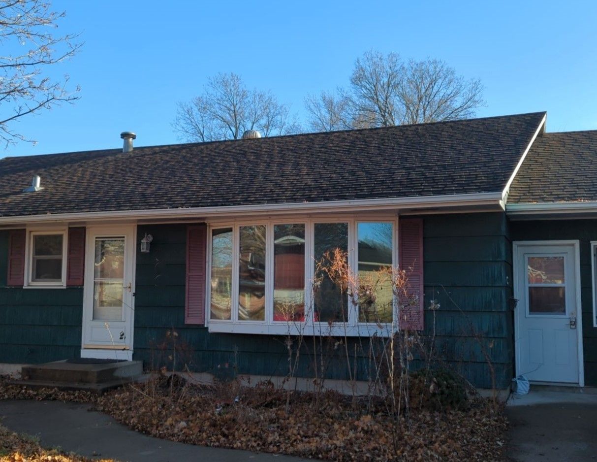 House Window Before — Carver, MN — TJ Exteriors Inc.