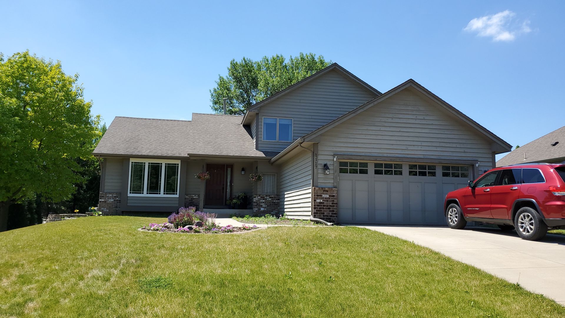 House During Summer — Carver, MN — TJ Exteriors Inc.