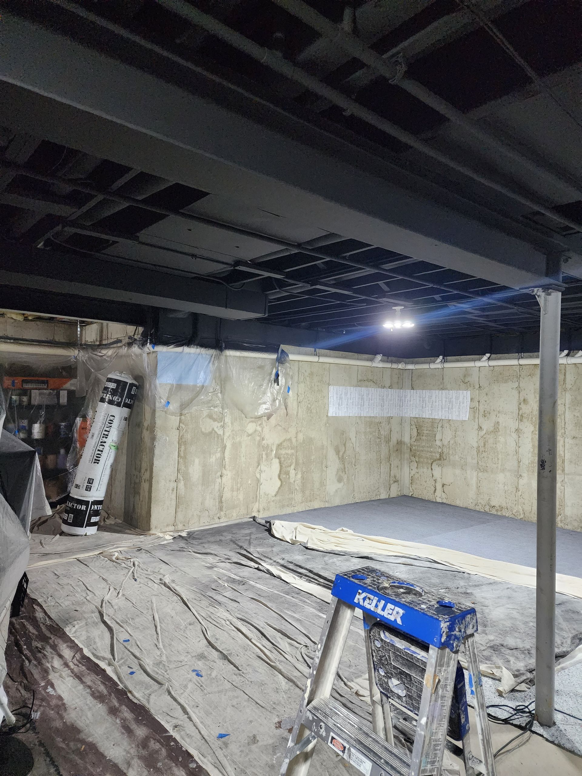 There is a ladder in the middle of the room.