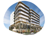 Modern multi-story building with glass and curved architectural features; sunny day.