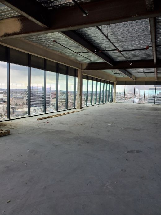 a large construction site with a lot of windows and a view of a city for on-site cpr/aed and first aid training with CPR-Professionals LLC (303) 918-8077.