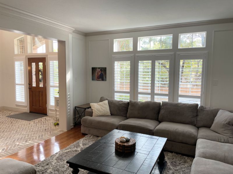 A living room with a couch and a coffee table