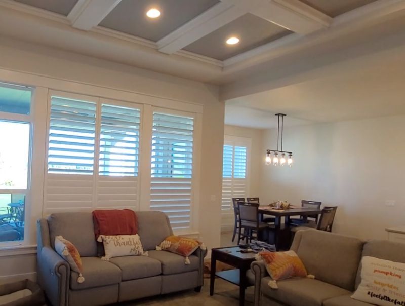 A living room with a couch and a table