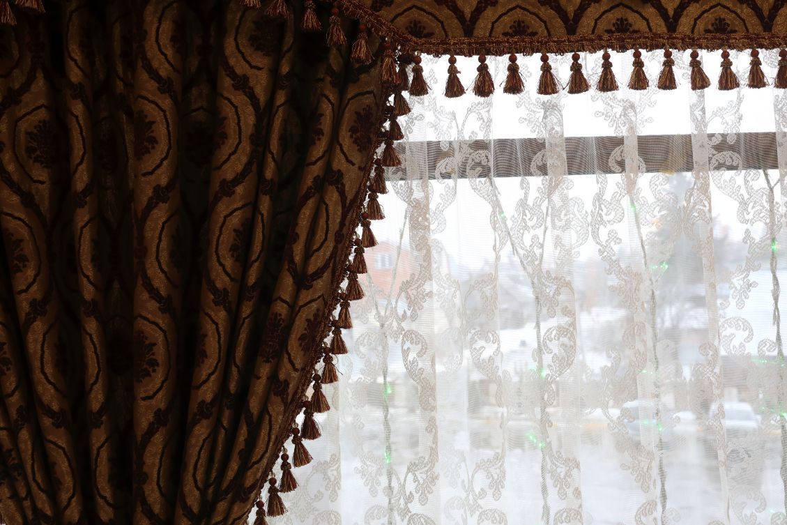 What Homeowners Should Know About Layering Curtains, Shades, and Blinds