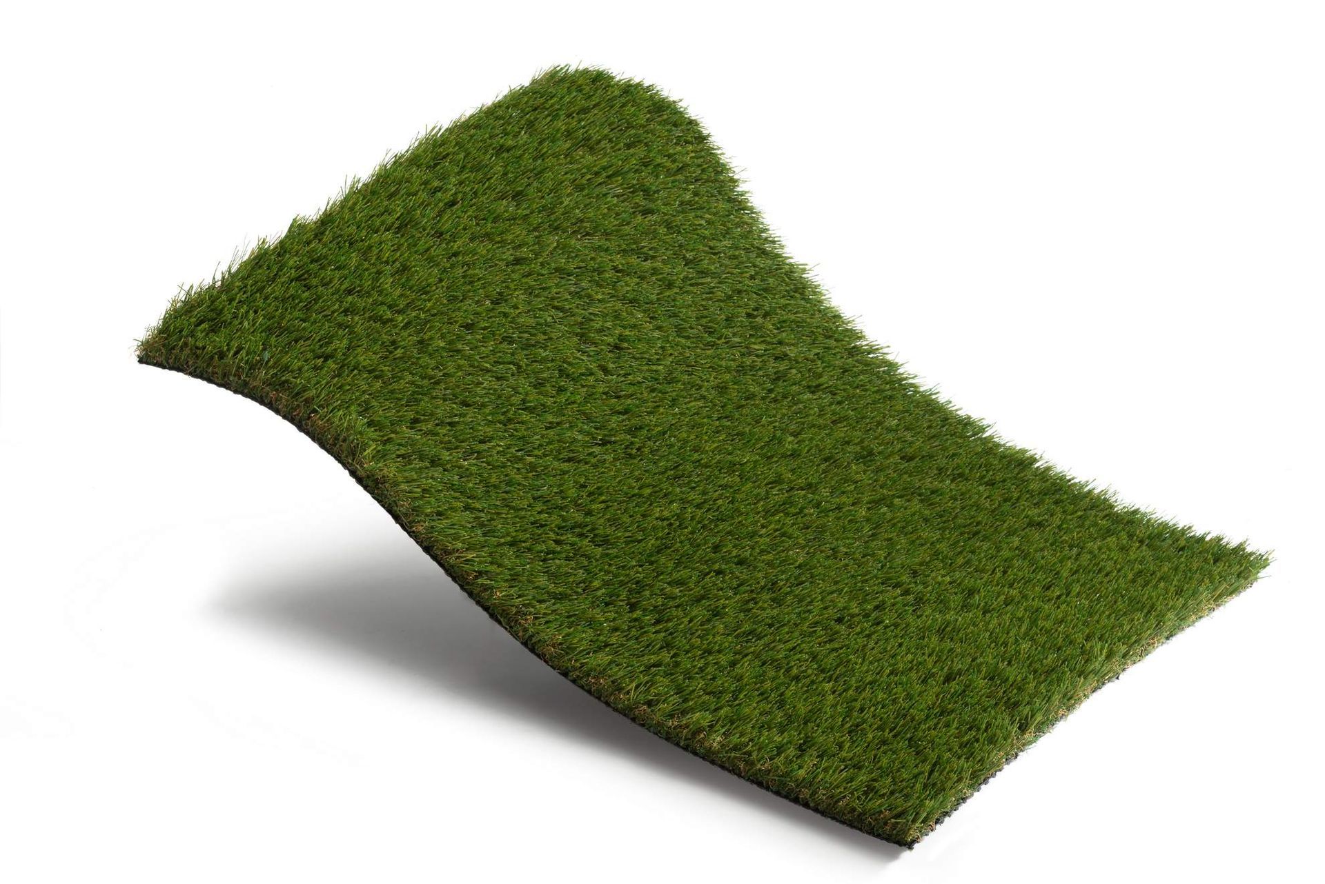 Kunstgrasmonster, donkergroen van kleur, op een witte achtergrond.