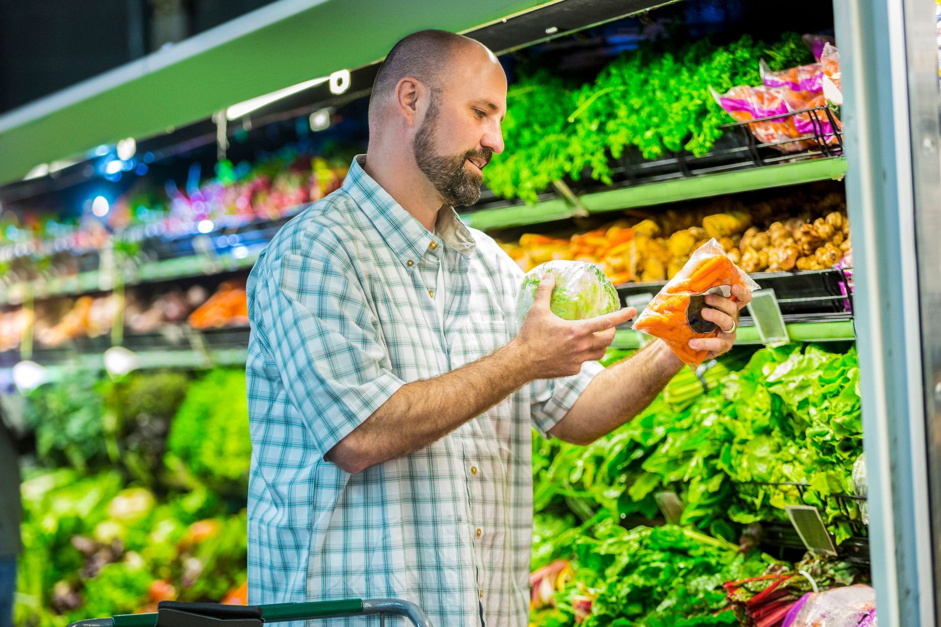 A man is shopping for healthy food options