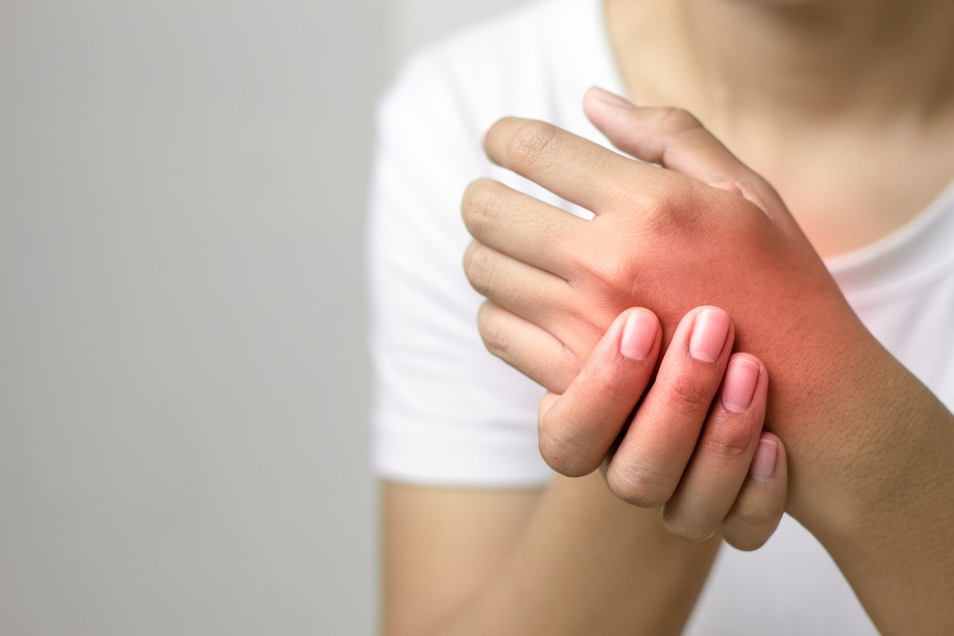 Touching Wrapped Knee - South Bend, IN - Kaurich Chiropractic & Wellness Center