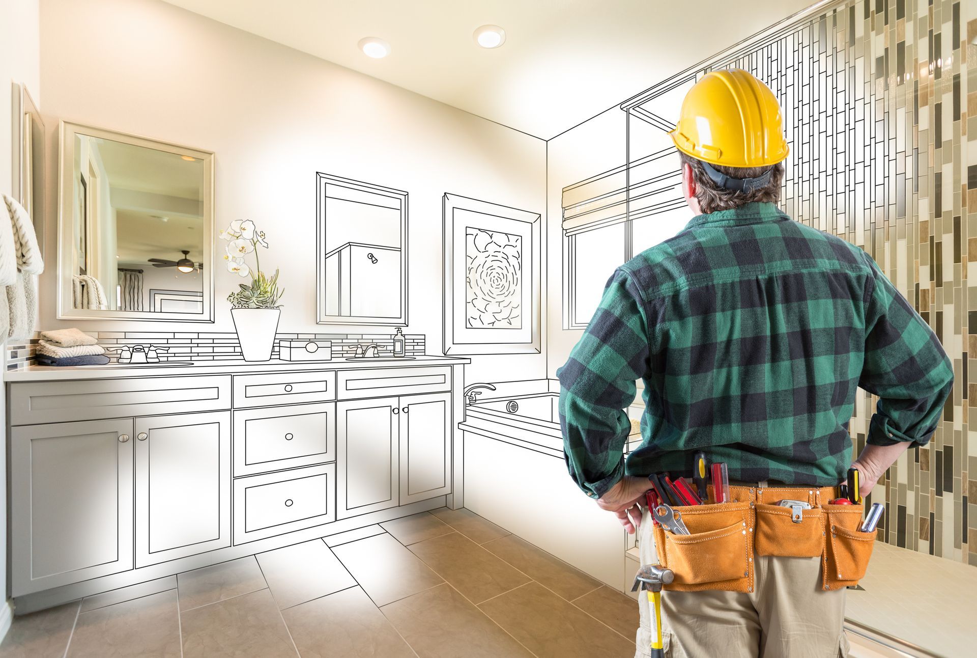 A Construction Worker Is Standing in A Bathroom with A Drawing of The Bathroom in The Background.