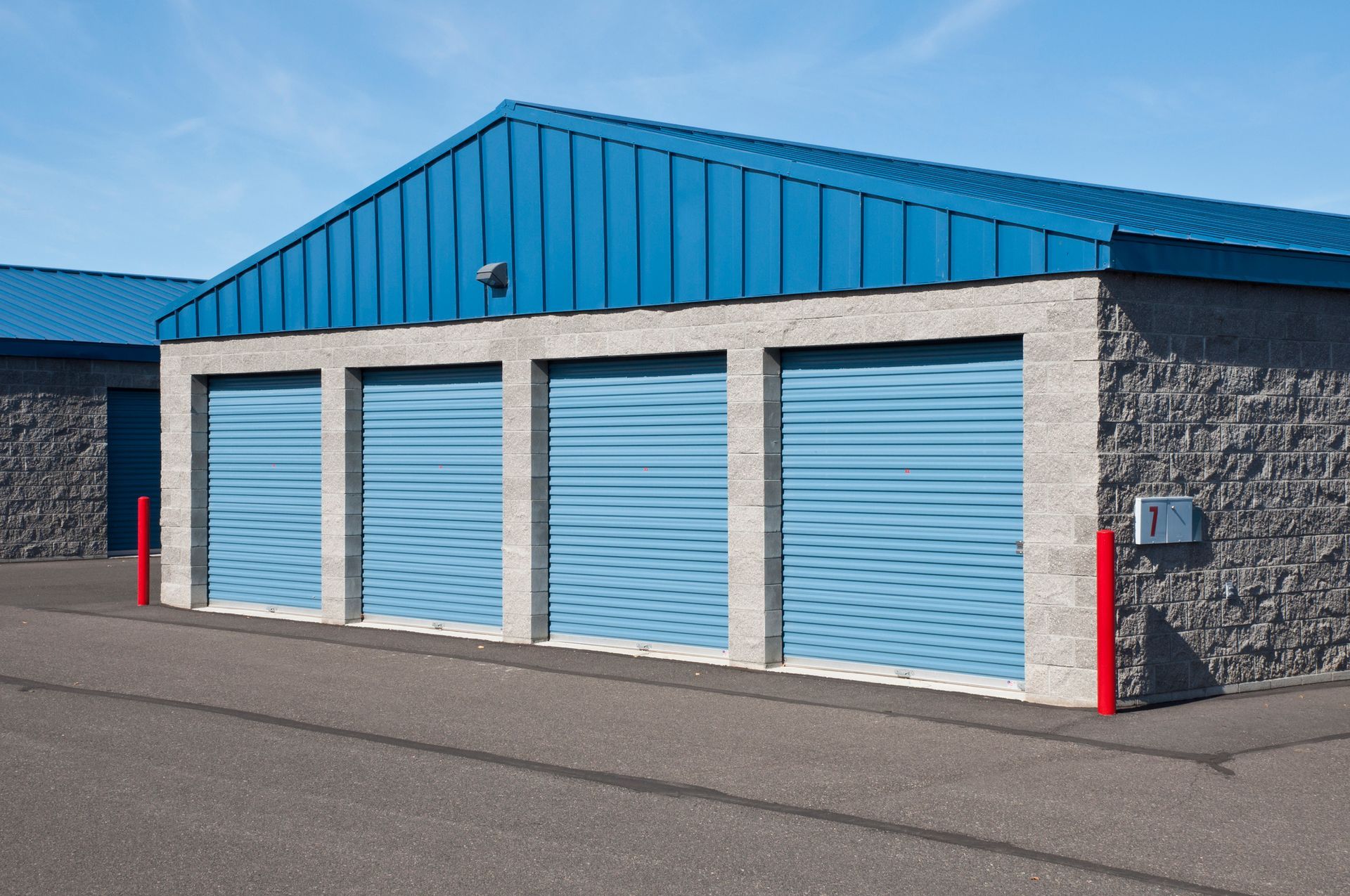 Close up exterior security unit highlighting garage doors from Blue Valley Door Co., Inc. in Lincoln, NE