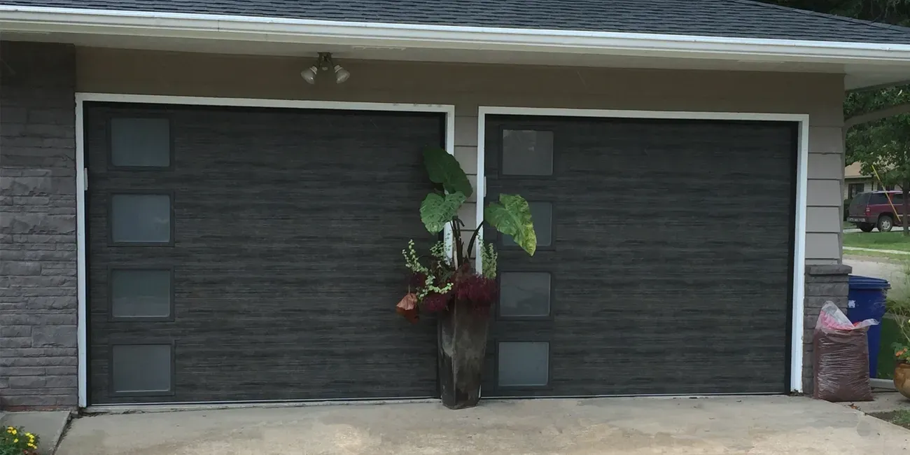Clopay Modern Steel Modern Grooved In Ultra Grain Cypress Slate Finish — Beatrice, NE — Blue Valley Door Co. Inc.