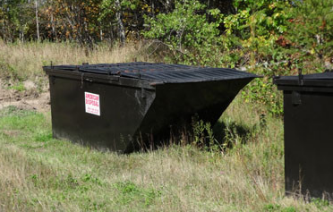 Single Black Dumpster — Deer River, MN — American Disposal