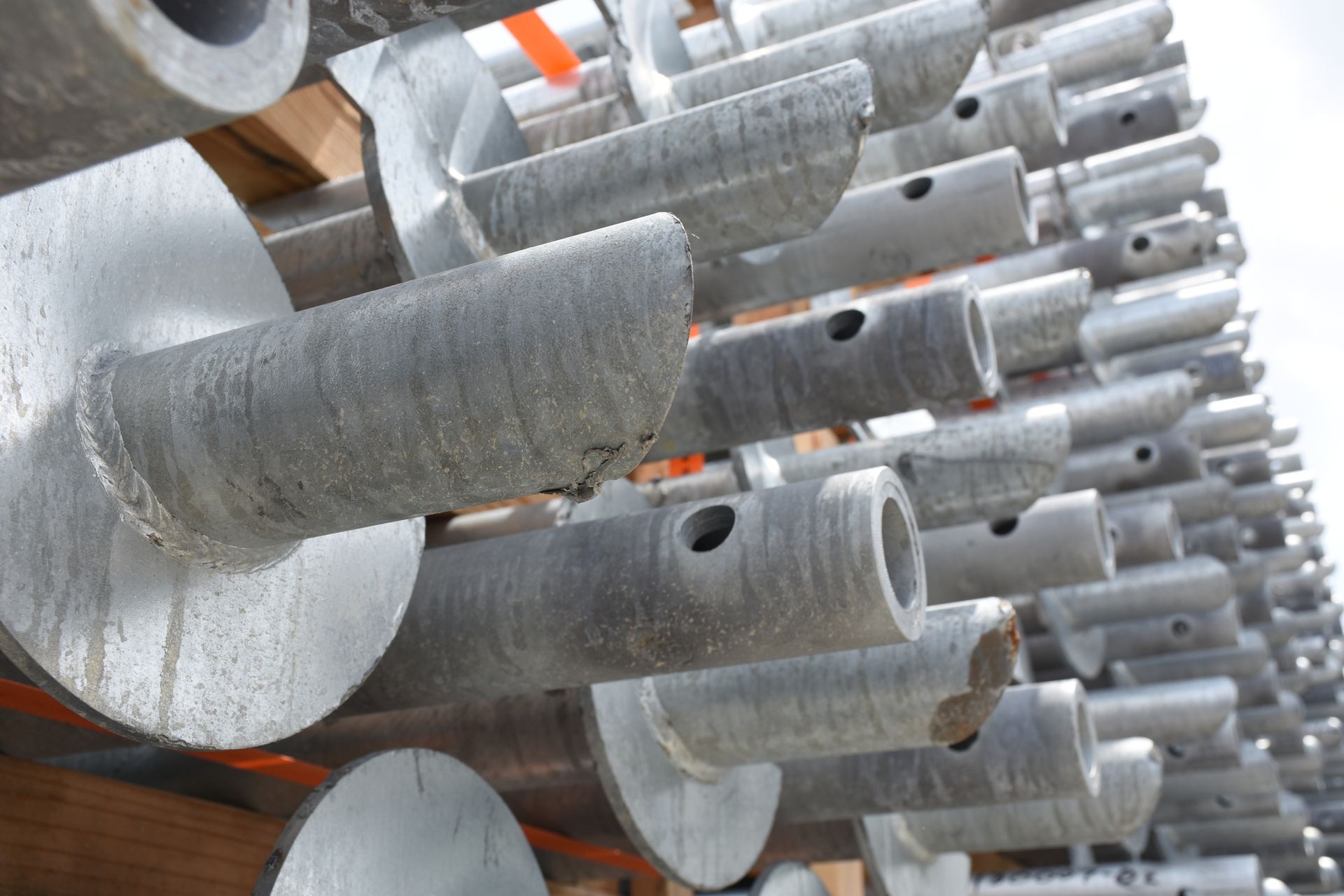 Helical piles galvanised and stacked.