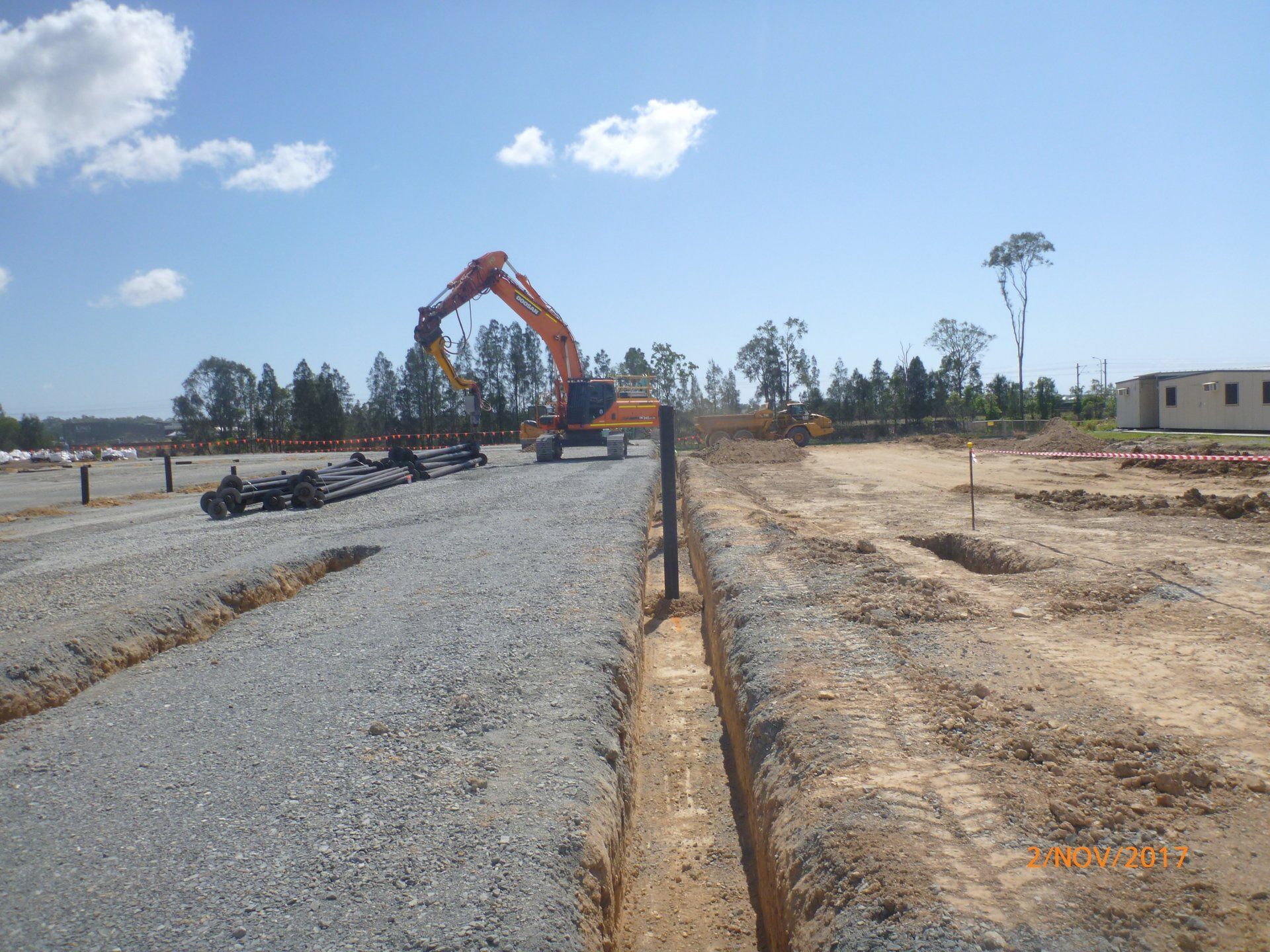 Screw Piles on Excavated Field — Southeast QLD — East Coast Group of Companies