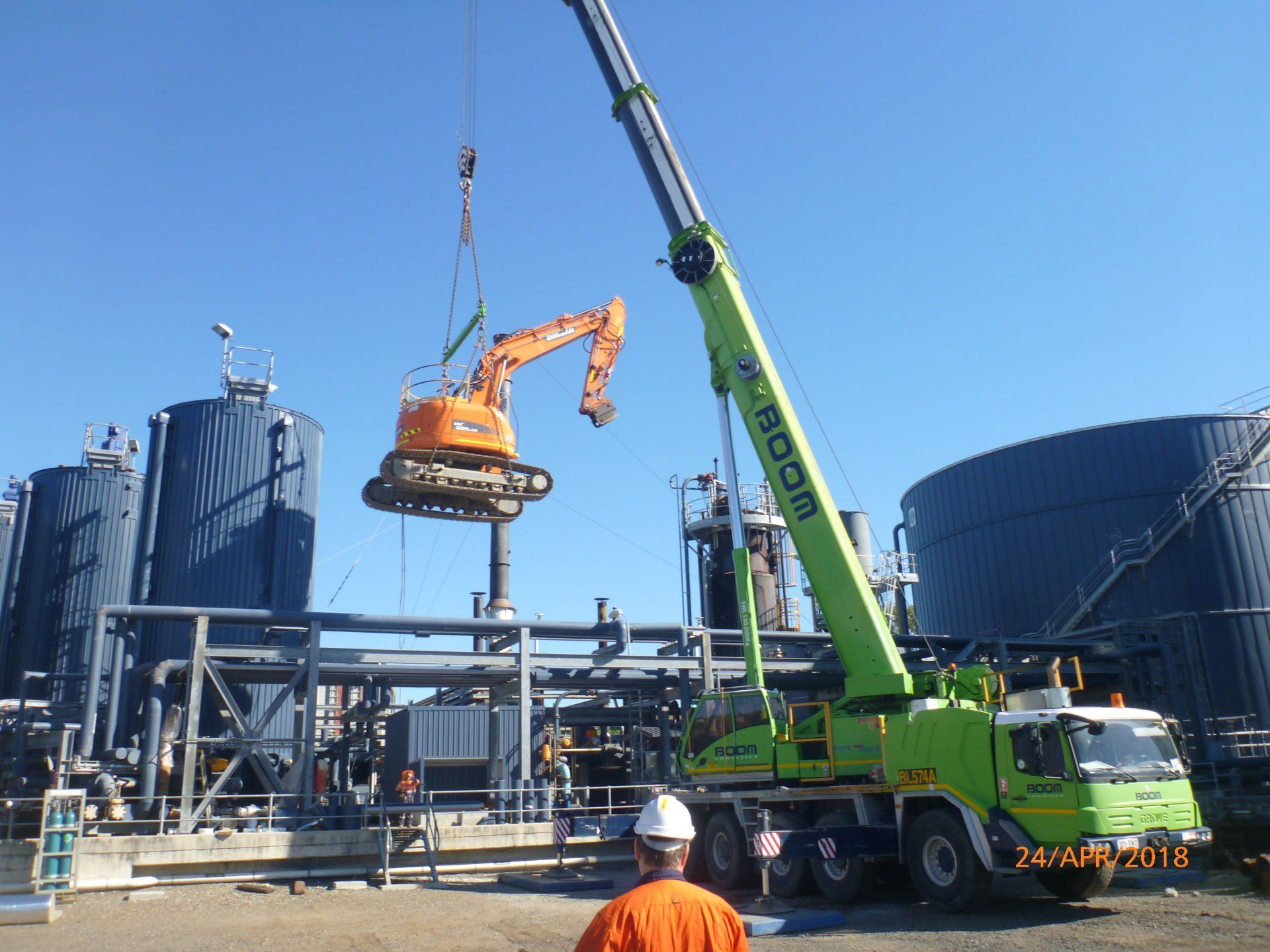 Crane Lifting Heavy Machinery — Southeast QLD — East Coast Group of Companies