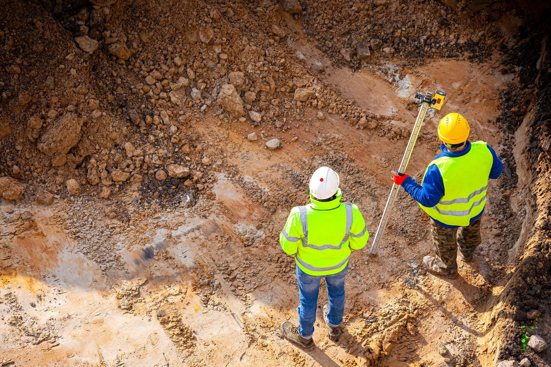 Soil engineers at the construction site.