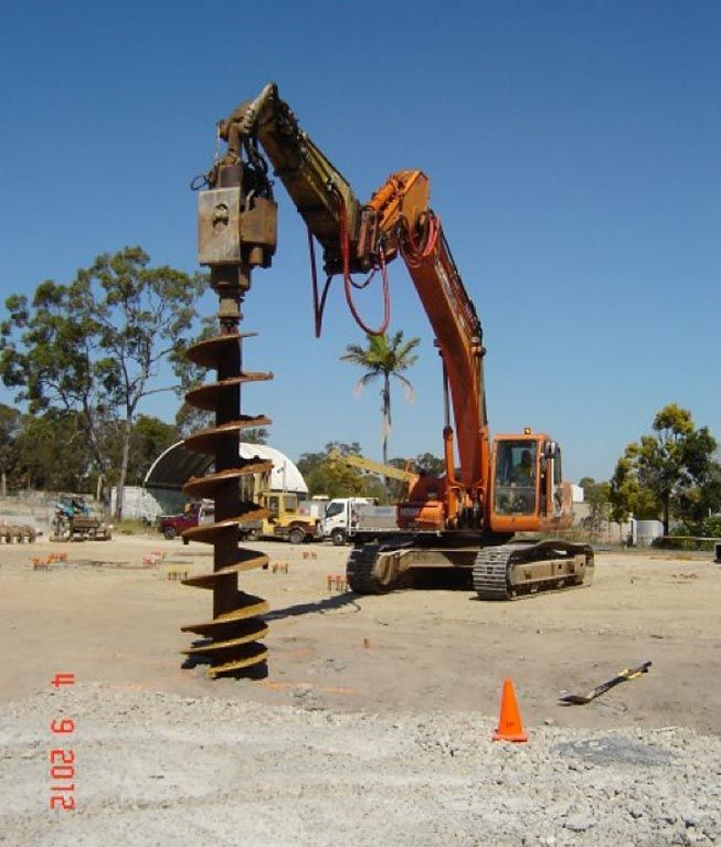 Drilling In Field — Southeast QLD — East Coast Group of Companies