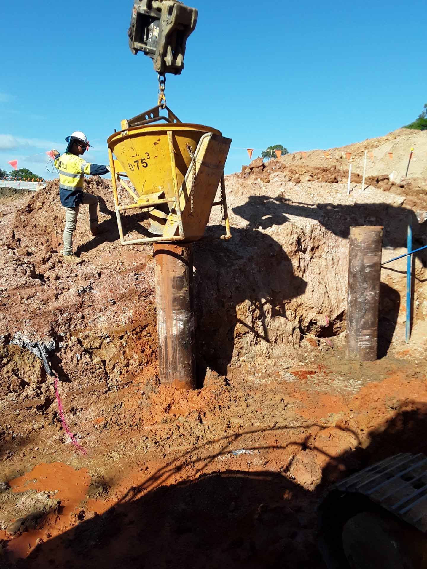 Metal Bars with Yellow Safety Rubber — Southeast QLD — East Coast Group of Companies