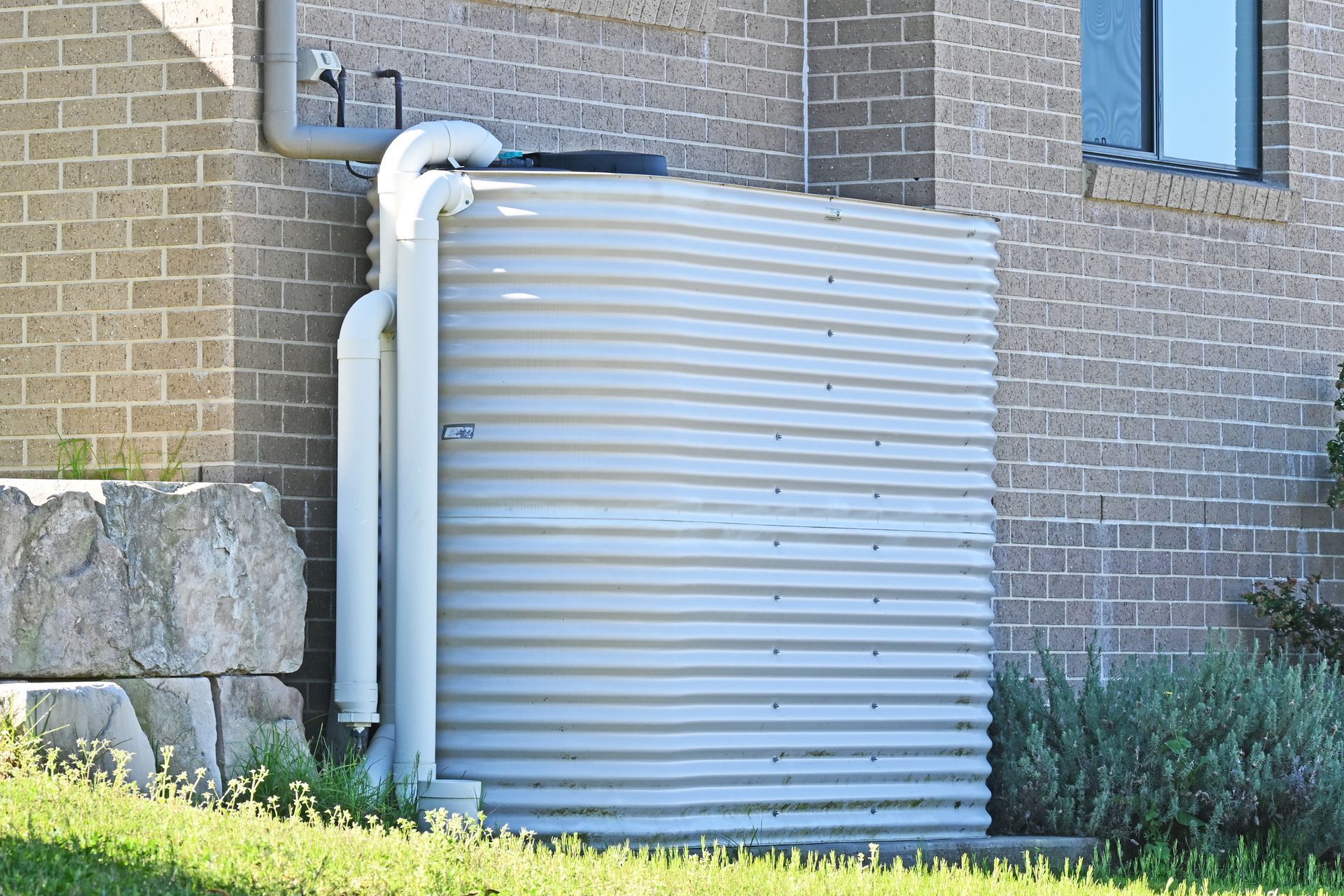 Metal rainwater storage tank by a trusted water tank supplier for efficient water storage.