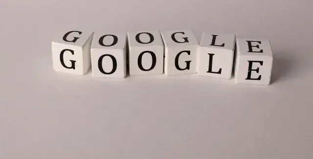 The word google is written on blocks on a white surface representing Google Ads (Pay-Per-Click) Service that we provide.