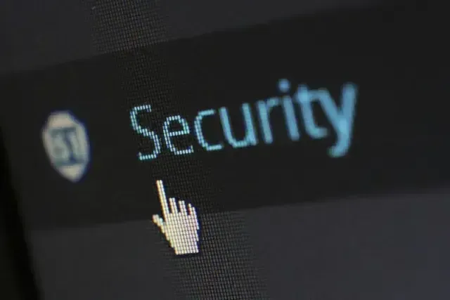 A computer screen with the word security shows SDL applying Website Security to business websites.