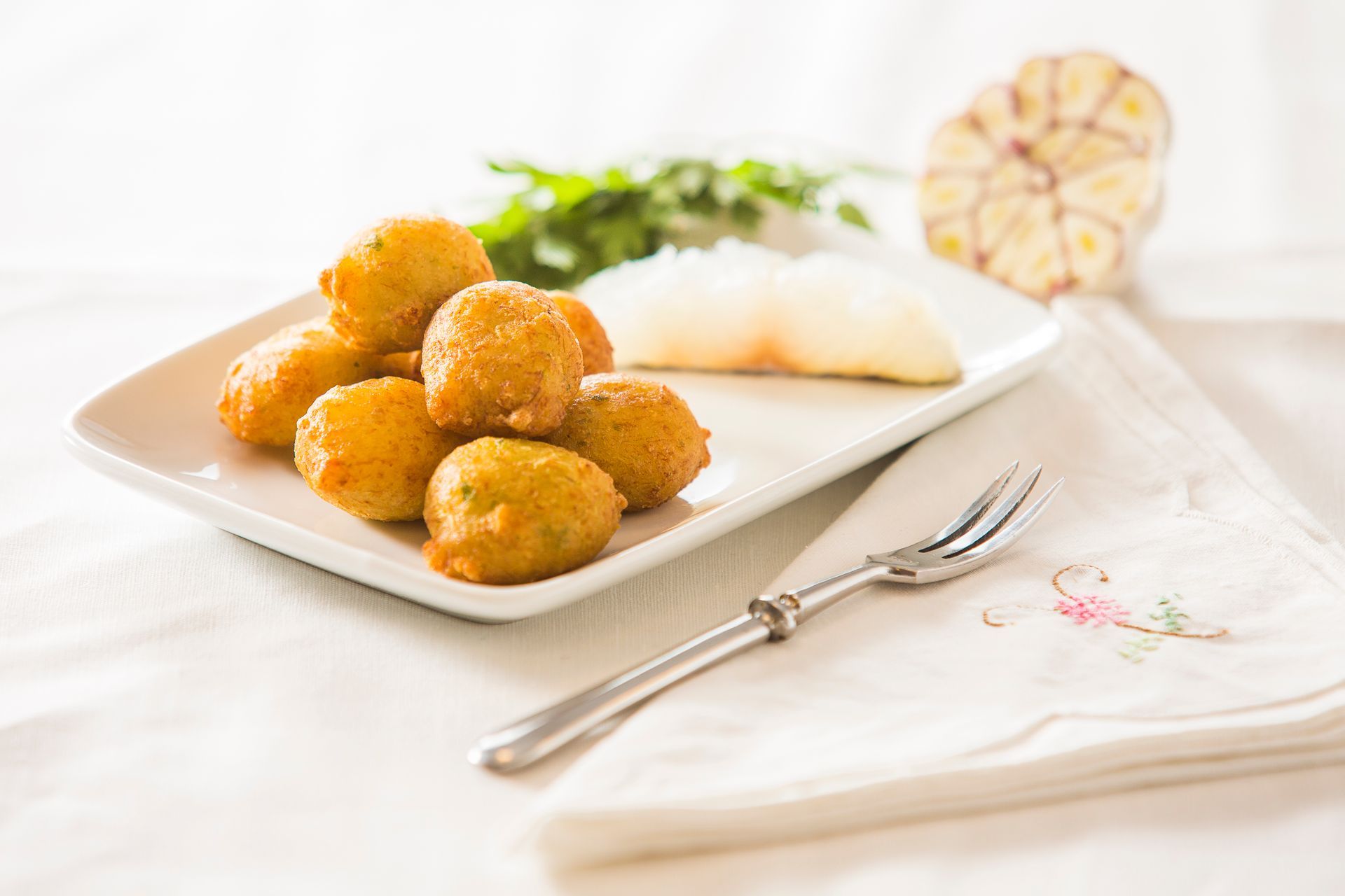 Cod tapas with cod fritters on a plate