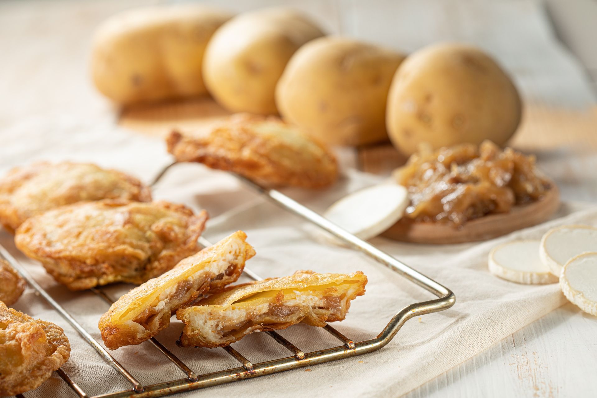 Potato tapas stuffed with caramelised onion and goat's cheese