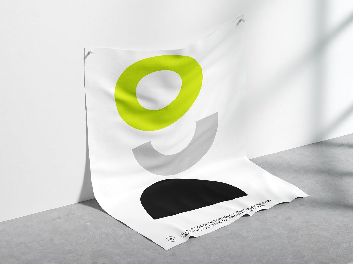 A piece of paper with a green circle on it is hanging on a wall.