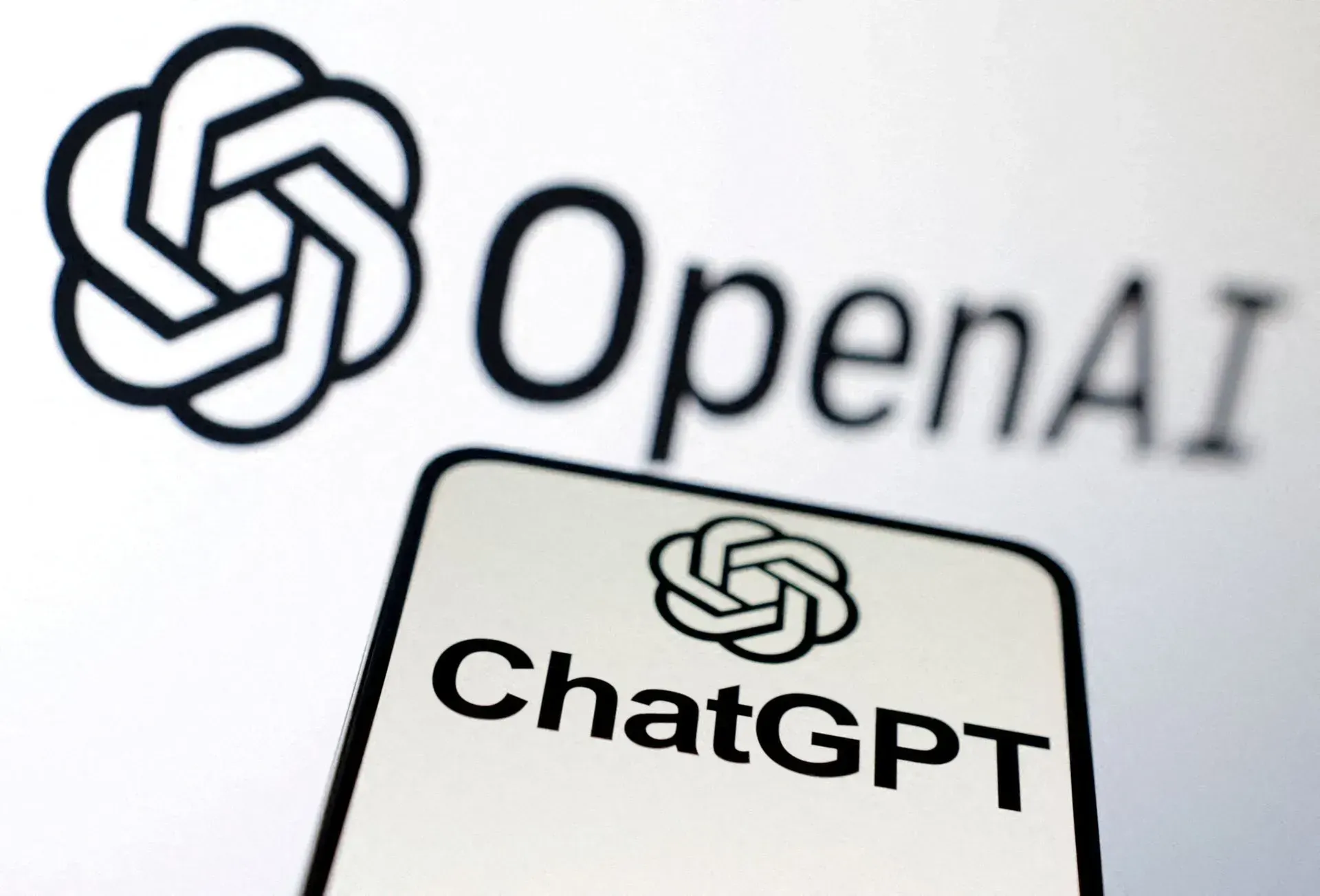 An openai logo is displayed next to a chatgpt logo