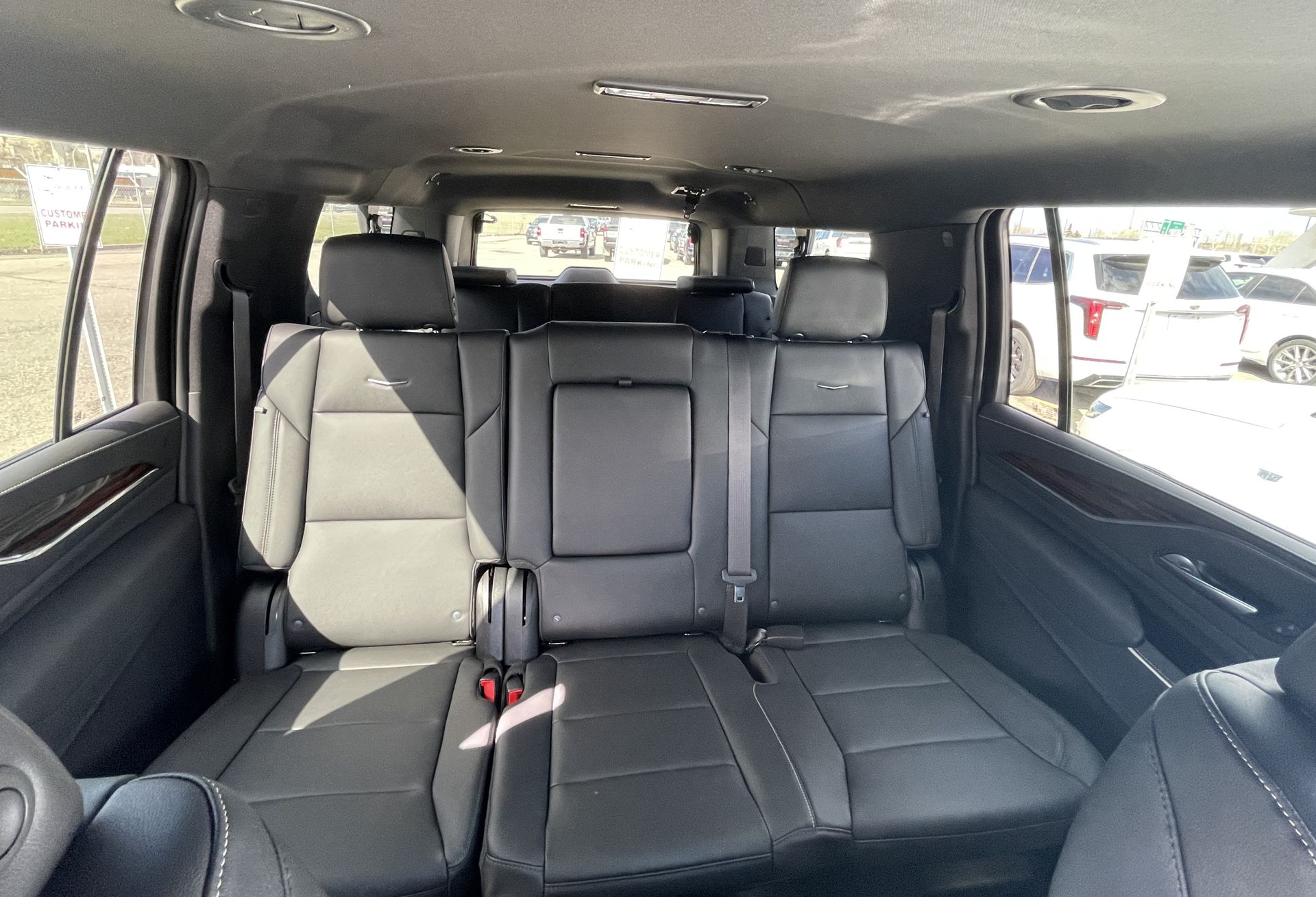 white 2023 Cadillac Escalade ESV middle row full bench seating
