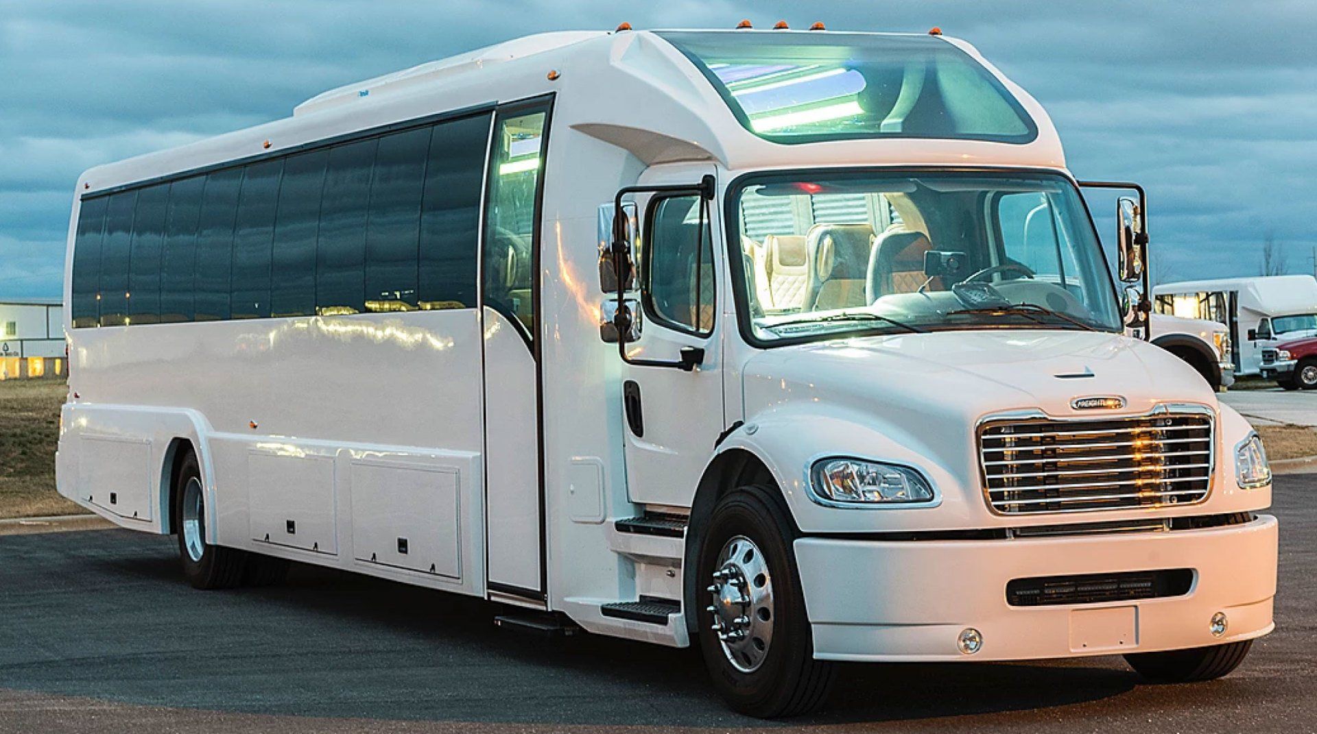 47 passenger white coach shuttle bus exterior