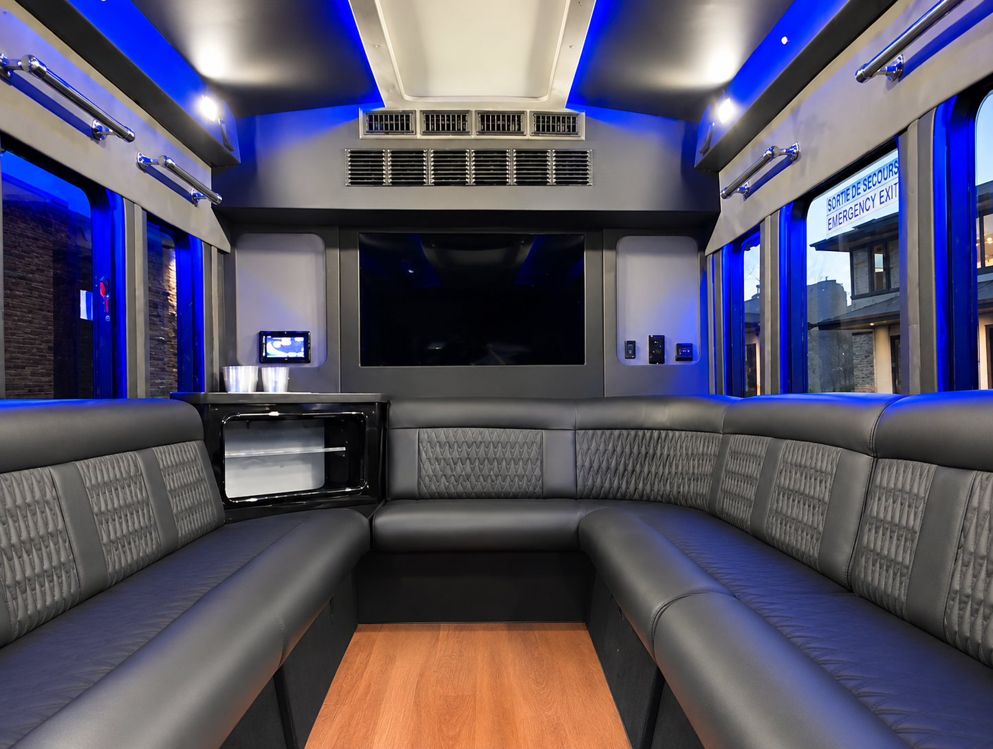 Ford Transit Battisti Limo To Go 12 Passenger black party bus interior front facing view