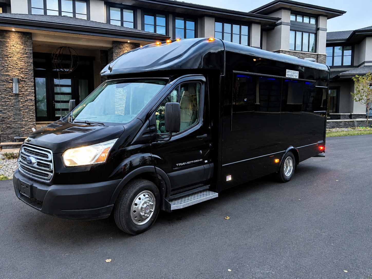 Ford Transit Battisti Limo To Go 12 Passenger black party bus exterior