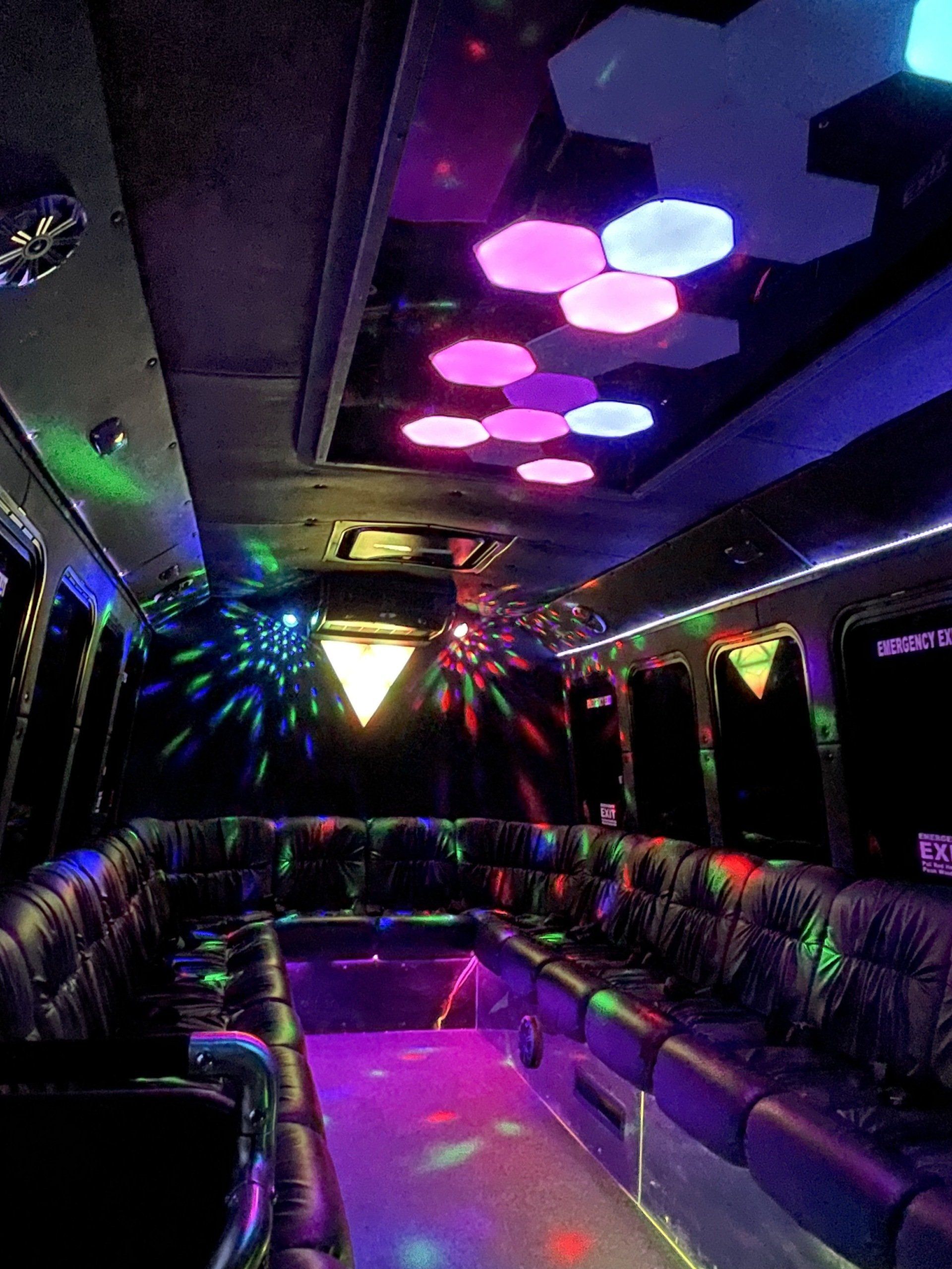 white 20 passenger Limo To Go Diamond Coach party bus interior LED lighting with perimeter plush seating