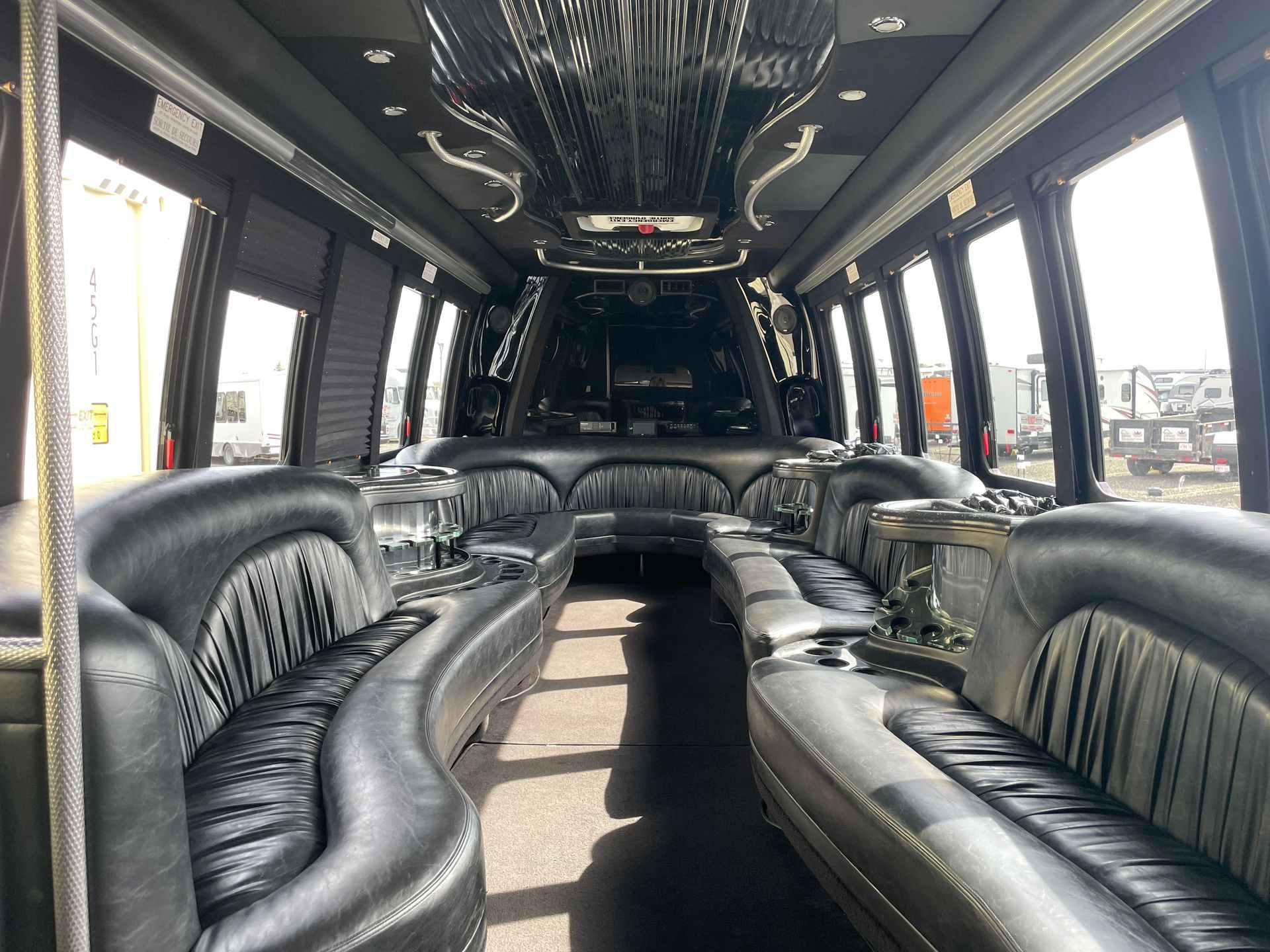 white 20 passenger Limo To Go Diamond Coach party bus interior LED lighting with perimeter plush seating