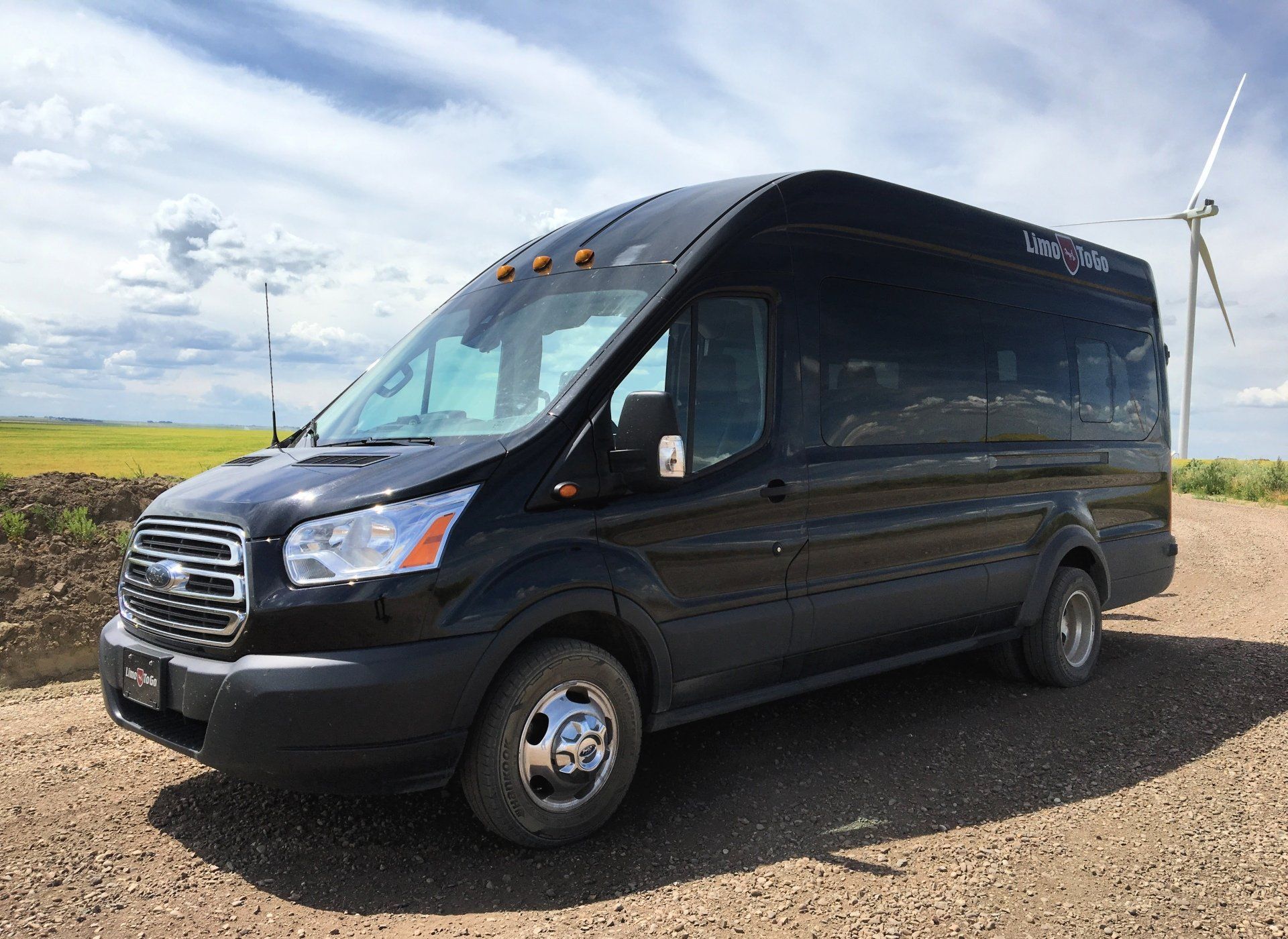 Limo To Go black 14 passenger executive shuttle bus