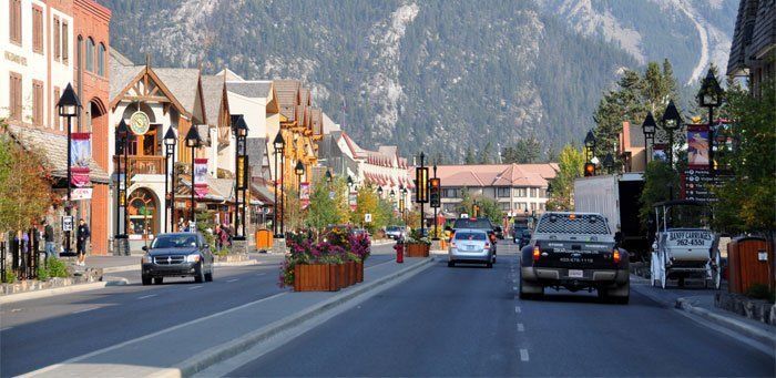 banff main street with cars and buildings