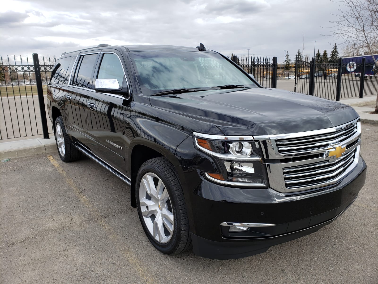 black Limo To Go luxury 6 passenger GMC Suburban full size SUV