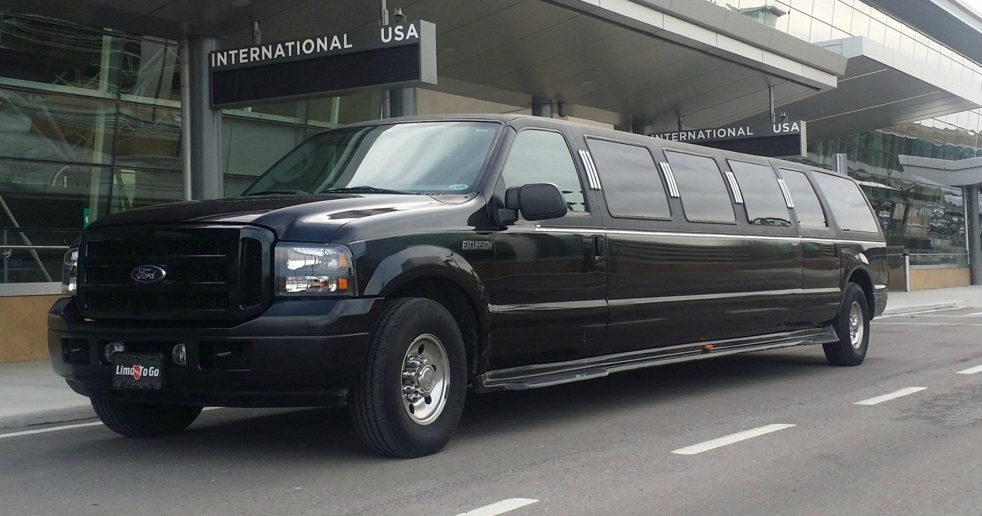 Limo To Go black stretch SUV limousine 14 passenger at airport