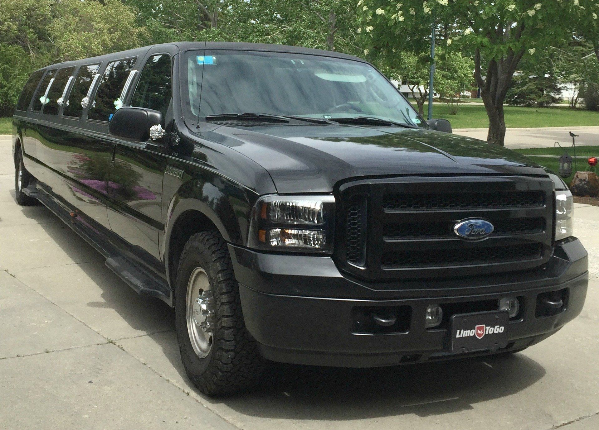black Excursion stretch SUV limousine