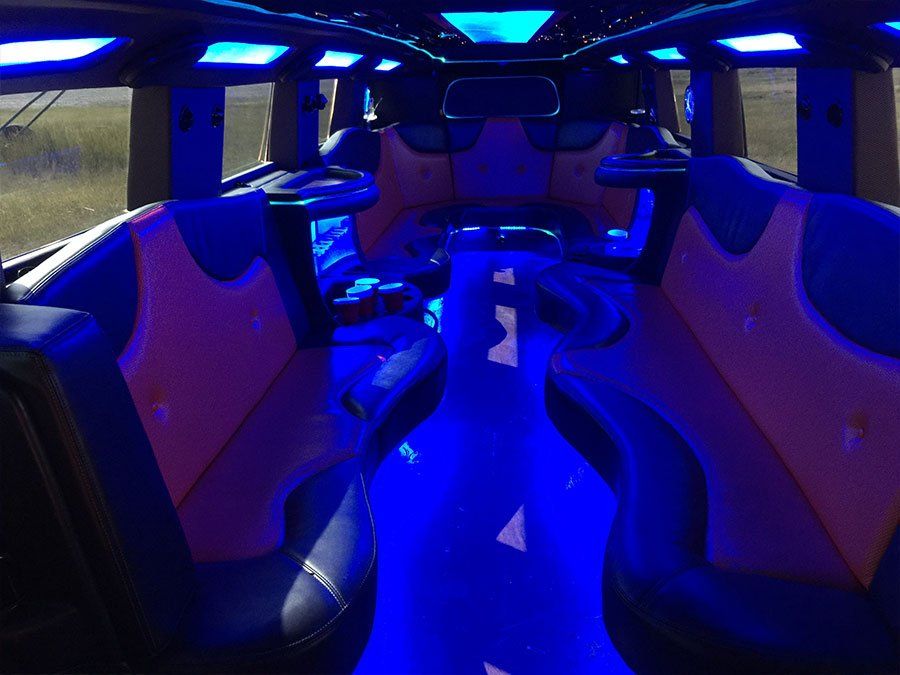 H2 Hummer stretch SUV limo lit interior seating