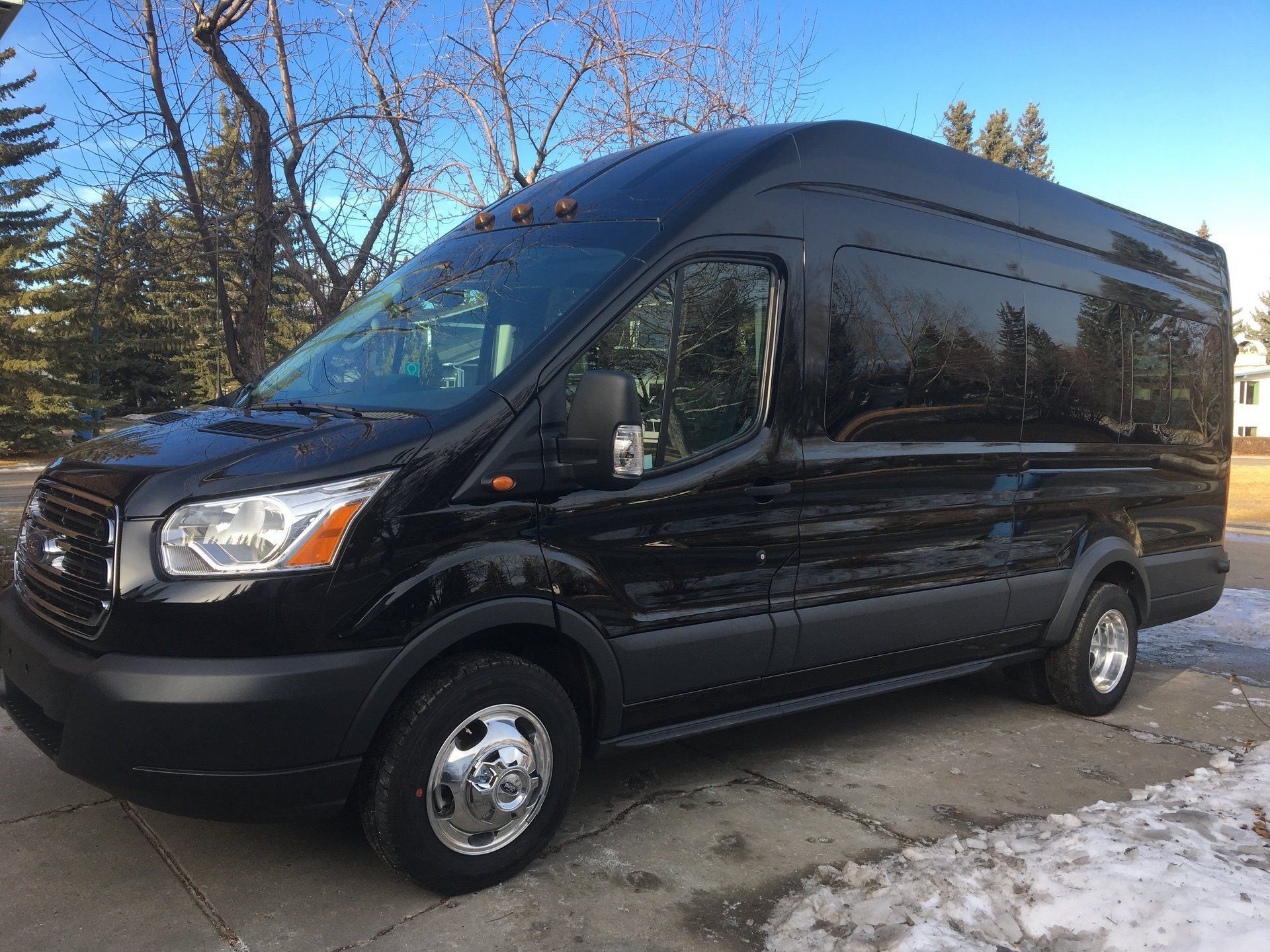 black shuttle van 14 passenger