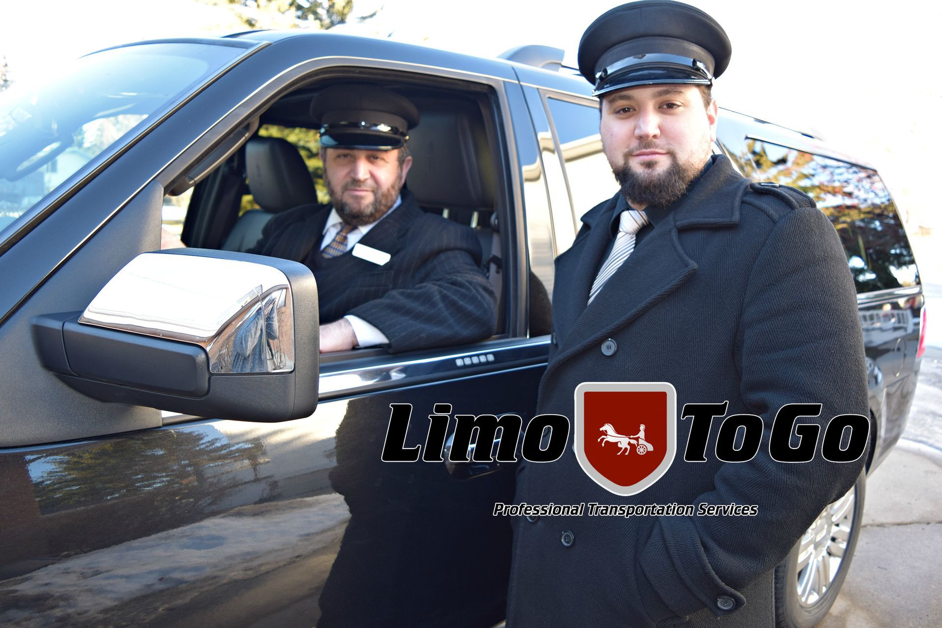 Two Limo To Go professionally attired chauffeurs