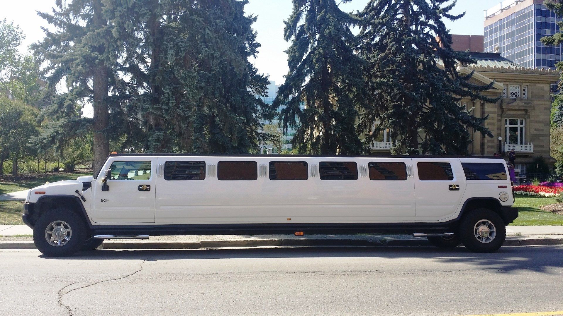 white Hummer stretch limousine 20 passenger Limo To Go