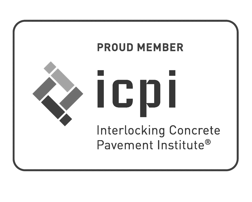 A black and white logo for the interlocking concrete pavement institute.